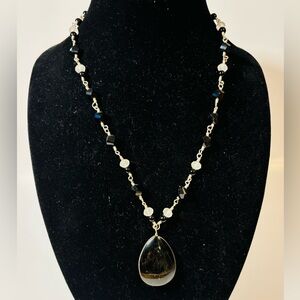 Long wire wrapped beaded necklace. Black tear drop pendent.